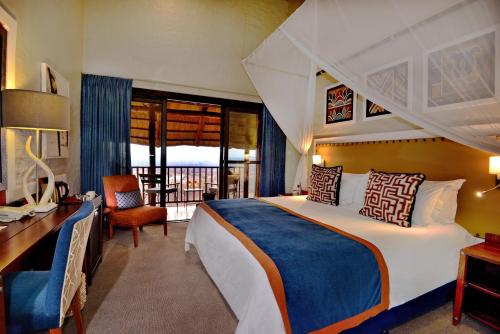 Katil atau katil-katil dalam bilik di Victoria Falls Safari Lodge