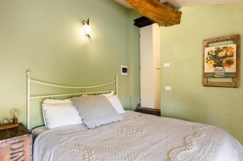 Ein Bett oder Betten in einem Zimmer der Unterkunft B&B Corte del Mincio