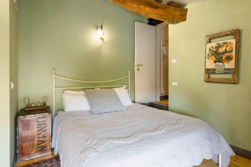 Ein Bett oder Betten in einem Zimmer der Unterkunft B&B Corte del Mincio