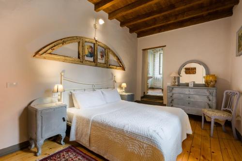 Postel nebo postele na pokoji v ubytování B&B Corte del Mincio