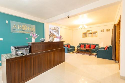 Χώρος καθιστικού στο Aroha Residency- A Countryside Resort