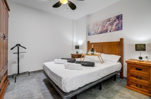 Ένα ή περισσότερα κρεβάτια σε δωμάτιο στο Casa Luisiana II