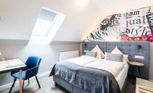 Letto o letti in una camera di YORS Boutique Hotel
