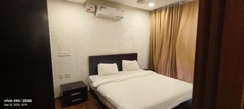 Кровать или кровати в номере Aarju Luxurious Stay Calangute