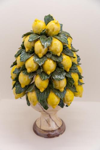 a statue of a pineapples tree at REGINNA LIGHTHOUSE in Maiori