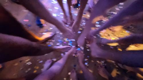 a group of people holding their hands in a tree at Emerald Spa Guest house in Krakow