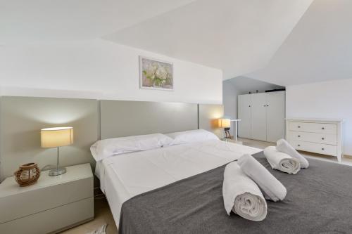 Giường trong phòng chung tại Apartment Harmony