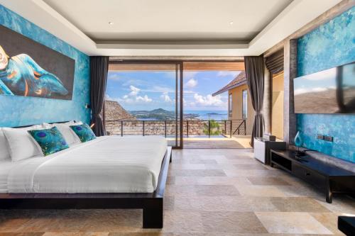 Postel nebo postele na pokoji v ubytování Villa Tiga - Cliffside Seaview Oasis