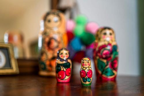 three figurines of dolls sitting on a table at Parkside Paradise Elegant Victorian Home Just Steps from the Park in Homestead
