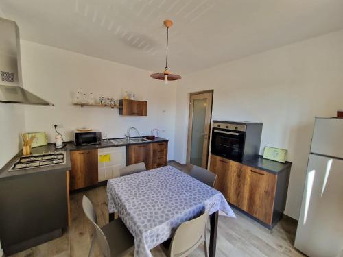 Kuchyň nebo kuchyňský kout v ubytování CASA MADE'