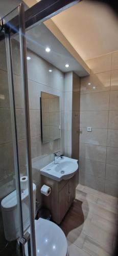 Koupelna v ubytování Hotel Antirriο