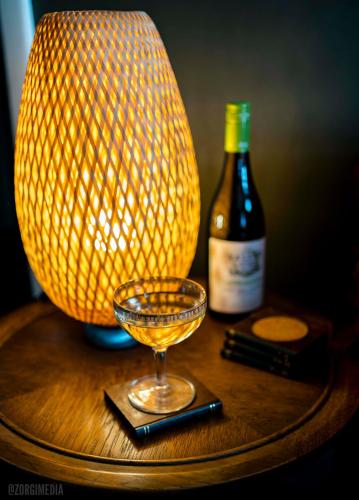 a bottle of wine and a glass on a table at The George Washington on Mt Washington in Pittsburgh