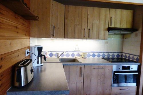Η κουζίνα ή μικρή κουζίνα στο Appartement centre village, 6 personnes, 2 chambres - CL23G