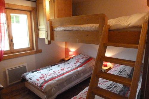 Ένα ή περισσότερα κρεβάτια σε δωμάτιο στο Appartement cosy, 6 personnes, 2 chambres - ECRINI08