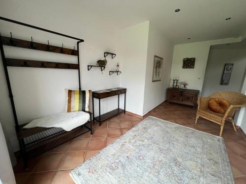 a bedroom with a bunk bed and a rug at Hof Dalhaus in Lüdinghausen