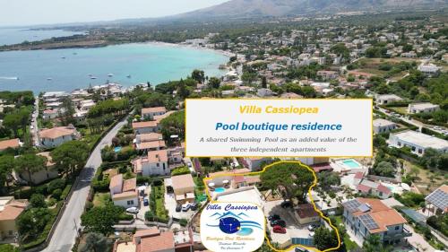 arial view of a villa with a view of the water at Pool Seaside Relais - VILLE Ninfea, Marea, Rosa e Cassiopea in Fontane Bianche