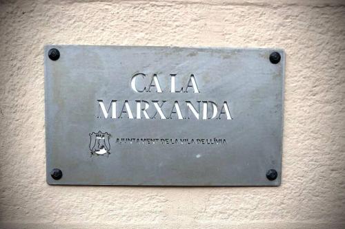 a sign that says cala marawi on a wall at La Cabañita de Llívia, Cerdanya, Puigcerdà in Llivia