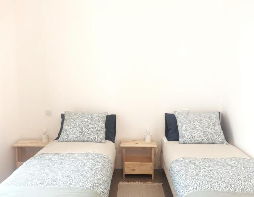Uma cama ou camas num quarto em Casa Pátio do Megué