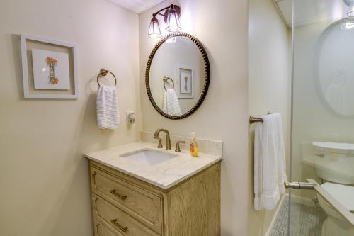 a bathroom with a sink and a mirror at Luxurious Morgantown Retreat with Stunning Views! in Morgantown