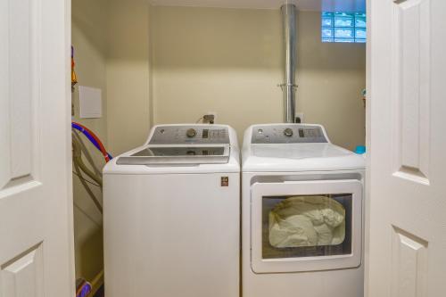 a kitchen with two machines in a room at Luxurious Morgantown Retreat with Stunning Views! in Morgantown