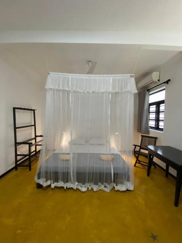 Pearl Villa Rooms and Hostelにあるベッド