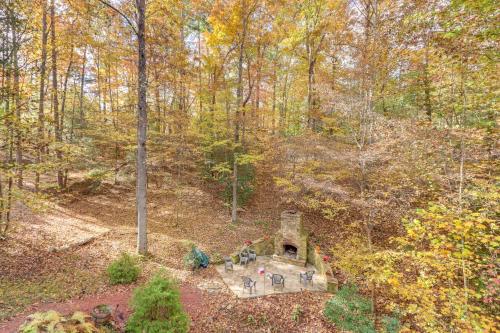 an overhead view of a house in the woods at Quiet Murphy Hideaway with Decks and Outdoor Fireplace in Murphy