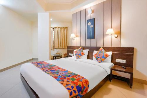 Cama o camas de una habitación en Gandharva Residency Swargate