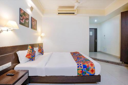 Cama o camas de una habitación en Gandharva Residency Swargate