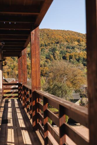 a view from the balcony of a wooden bridge at Садиба Казка in Vizhenka