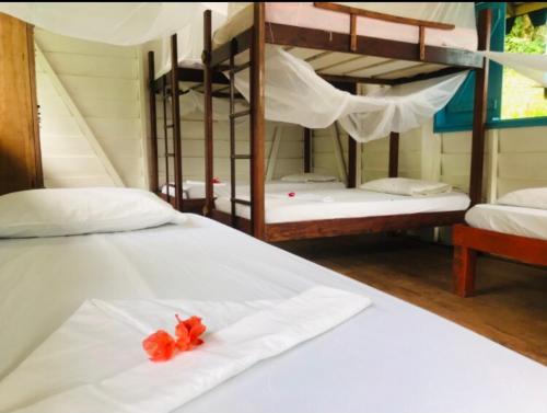 Una cama o camas en una habitación de Hostal Doble Vista
