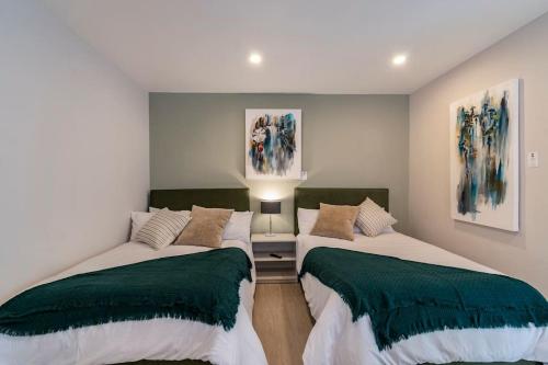 two beds sitting next to each other in a room at LOVELY LOFT COYOACAN (DIEGO) in Mexico City