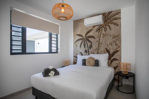 Postel nebo postele na pokoji v ubytování Oasis luxury apartment in Jan Thiel - close to the beach