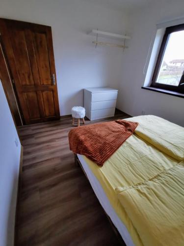 Postel nebo postele na pokoji v ubytování Rodinná Rezidence Žihobce - prázdninový dům