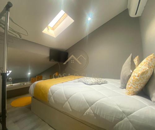 Cama ou camas em um quarto em Casa D`El Rei