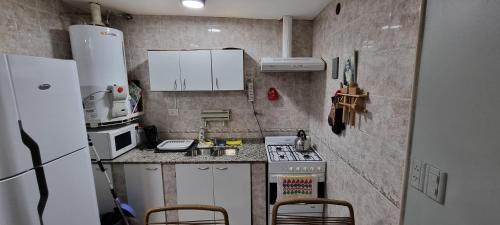 Η κουζίνα ή μικρή κουζίνα στο 166 1/2