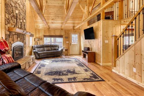 a living room with a couch and a fireplace at Black Bear Hideaway in South Lake Tahoe