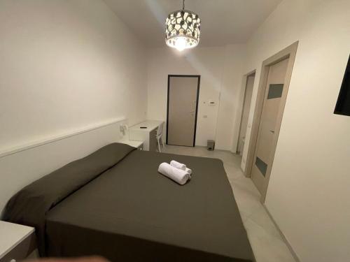 A bed or beds in a room at La Dimora del Maggio