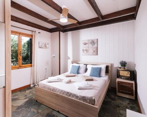 Posteľ alebo postele v izbe v ubytovaní Wooden Beach House
