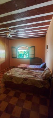 Postel nebo postele na pokoji v ubytování Aluguel Casa em Praia Seca