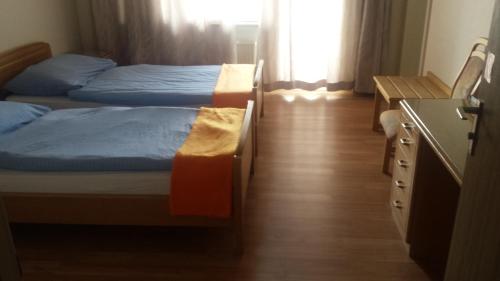 
Ein Bett oder Betten in einem Zimmer der Unterkunft Hotel Restaurant Klösterli

