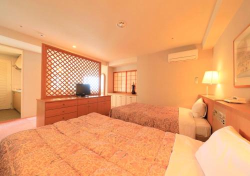 Krevet ili kreveti u jedinici u objektu Kamogawa Grand Tower - Vacation STAY 53394v