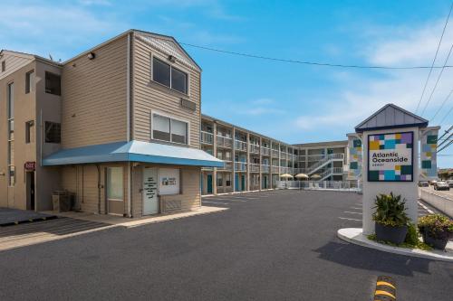 an empty parking lot in front of a building at Atlantic Oceanside Dewey in Dewey Beach