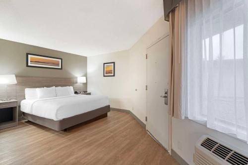 Ένα ή περισσότερα κρεβάτια σε δωμάτιο στο Quality Inn Idaho Falls
