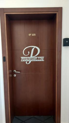a door with the if job sign on it at Modern Top Floor Sea View 3BR with Pools, Spa & Fitness in Becici