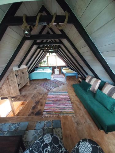 an overhead view of a living room in a attic at Magaze de Luxe in Gradačac