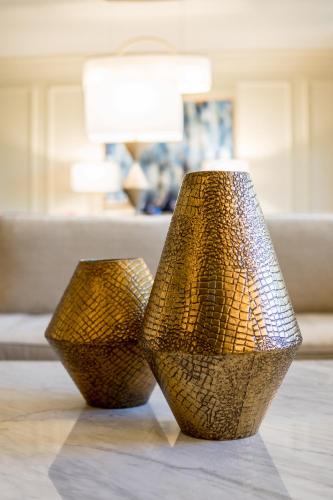 two brown vases sitting on top of a table at Green Valley Ranch Resort Spa Casino in Las Vegas