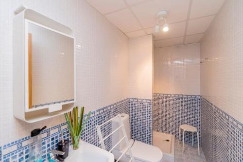 Et badeværelse på 4 Bed Duplex with Stunning Sea Views