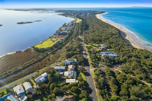 an aerial view of the shoreline of a beach at The Beach Shack in Queenscliff