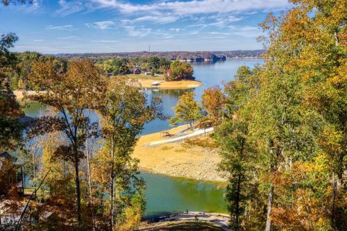 an aerial view of a lake in the fall at Smoky Lake Retreat cabin in Dandridge