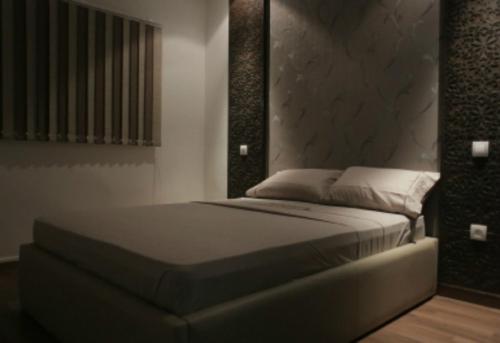 Ліжко або ліжка в номері Rabat Apartments